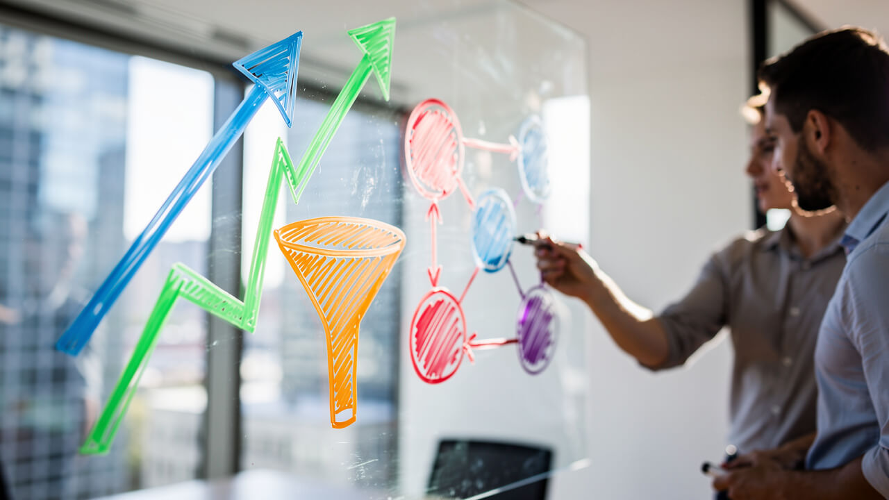 Team reviewing A/B test results to maximize ad campaign ROI